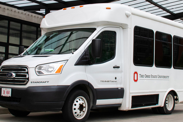 Paratransit bus with The Ohio State University logo on the side