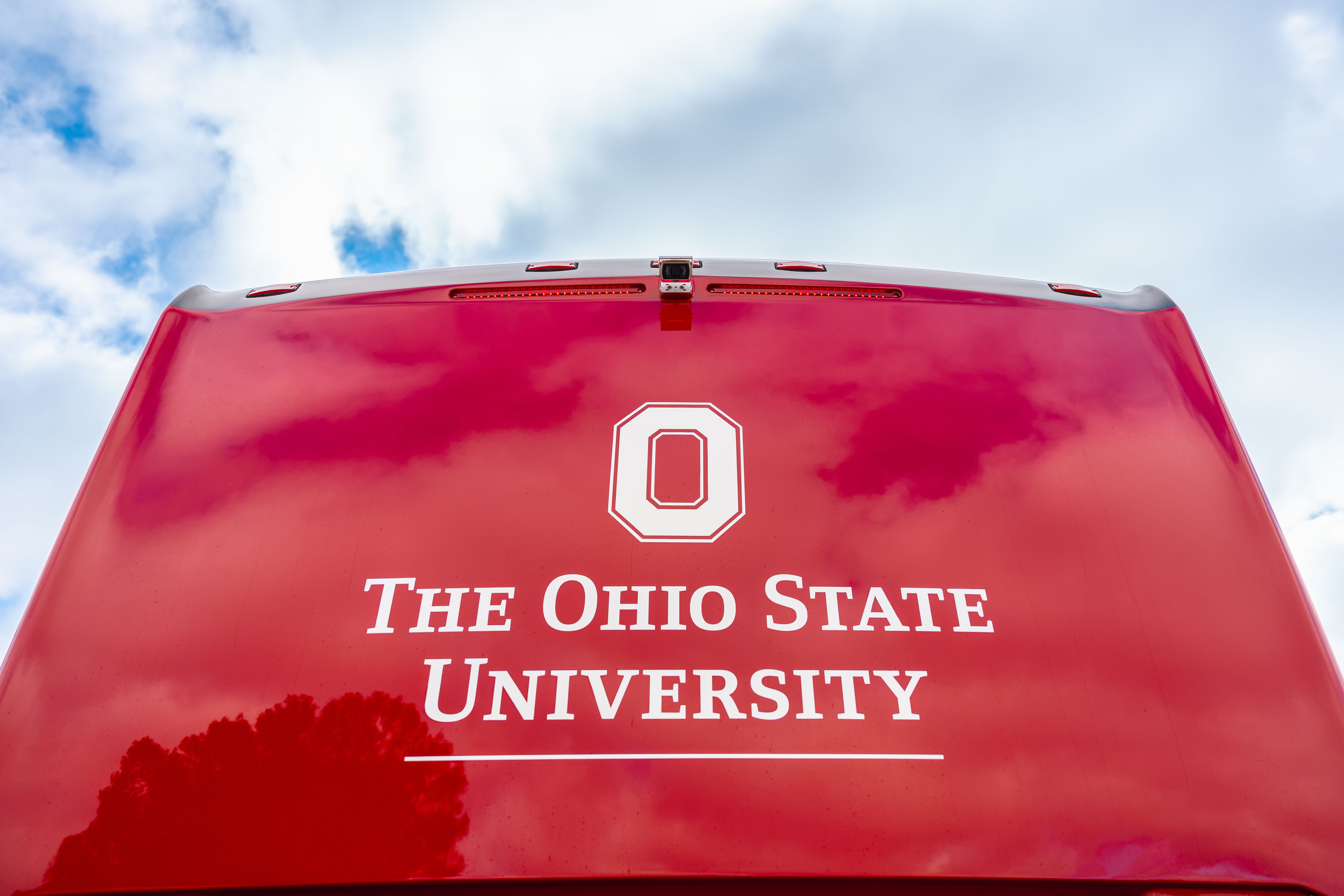 Rear view of The Ohio State University charter bus