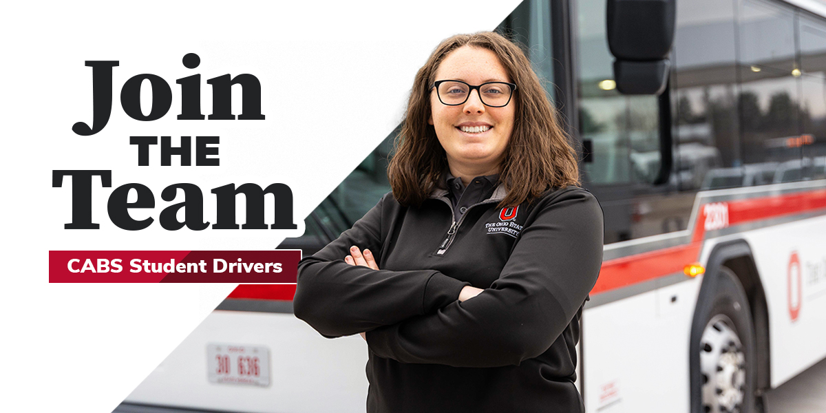 student standing in front of bus, join the team text is next to her