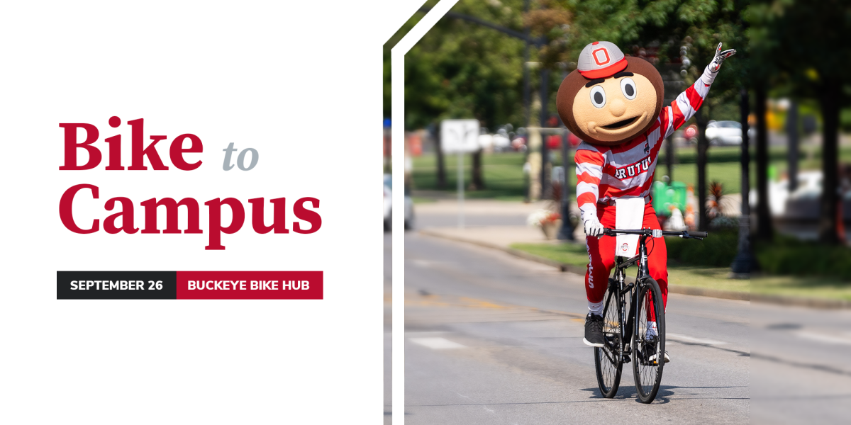 Brutus mascot on bike with helmet