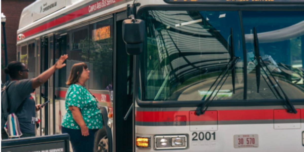 Riders getting on a CABS bus